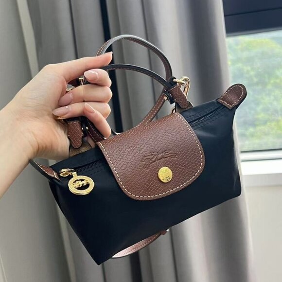 Longchamp Elegant Black and Tan Travel Bag - Picture 1 of 5